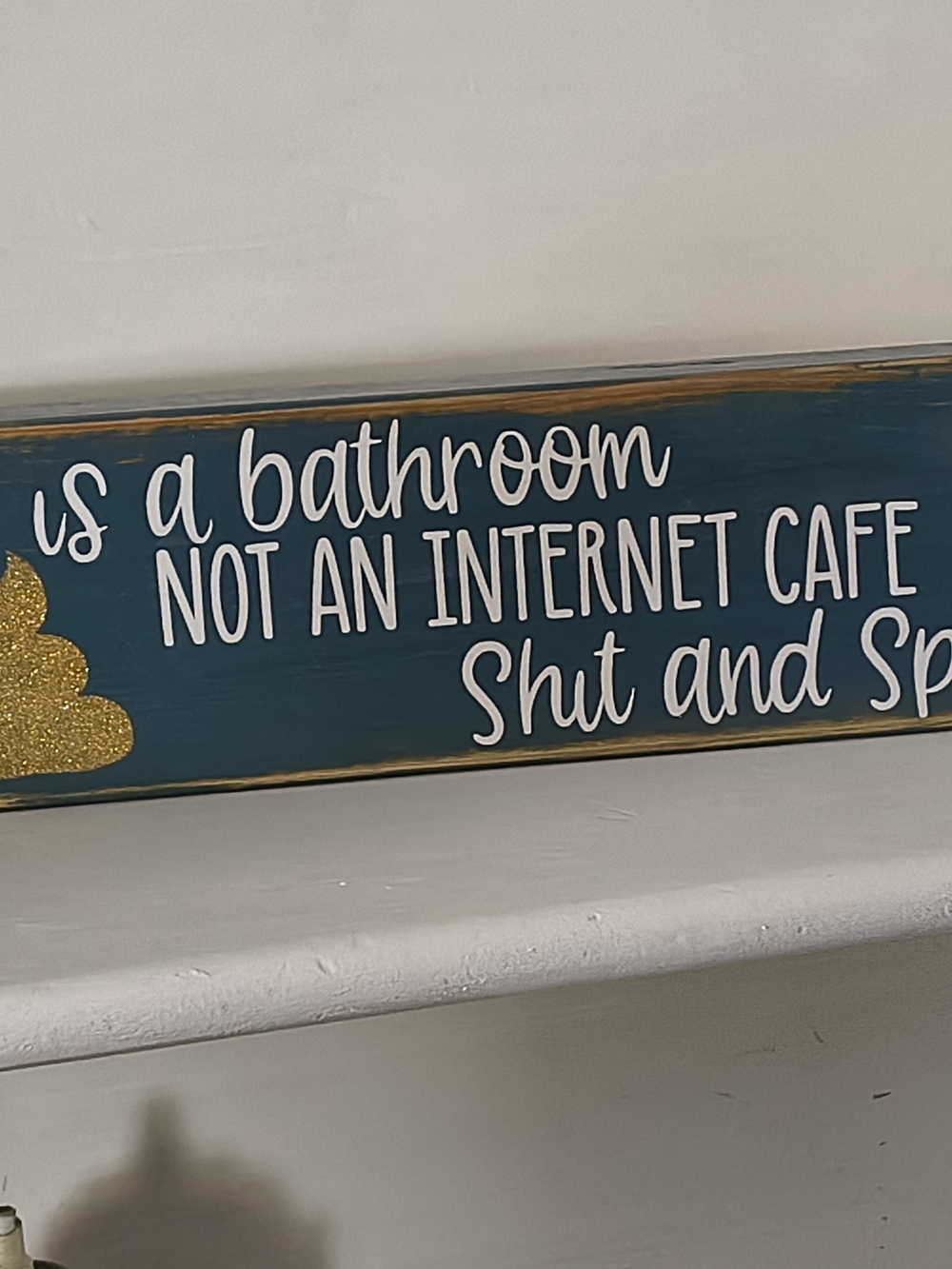 Teal Wooden Bathroom Wall Sign with White Lettering and Gold Accent